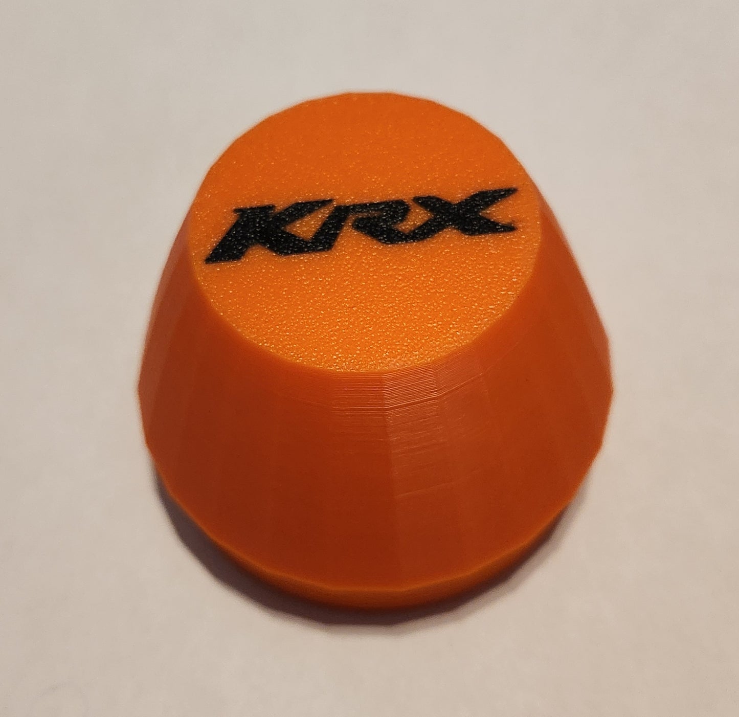 Set of 4 orange center caps with black KRX logo for oem KRX1000 wheels