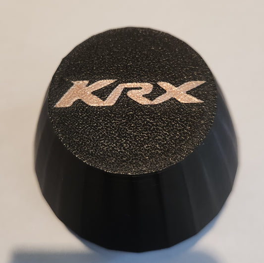 Set of 4 black center caps with copper KRX logo for oem KRX1000 wheels