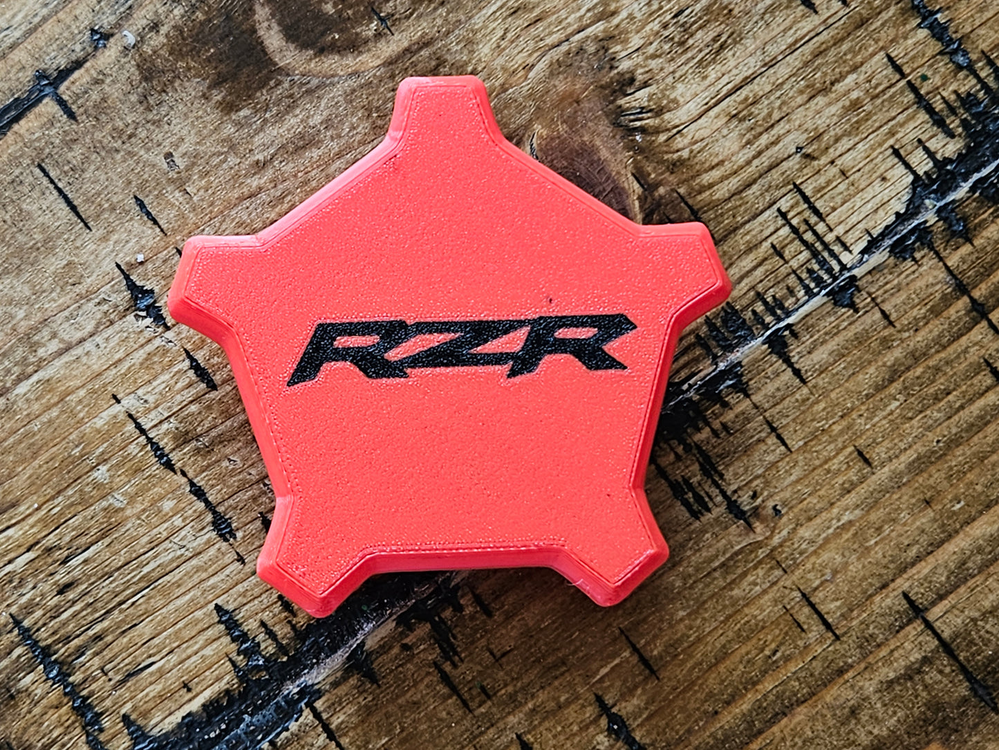 Red RZR Pro R Center Caps With Black Rzr Logo